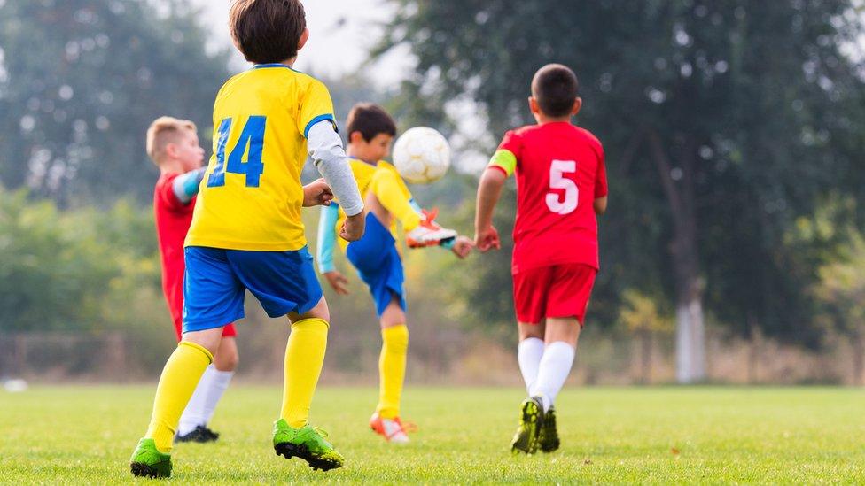 Children playing football