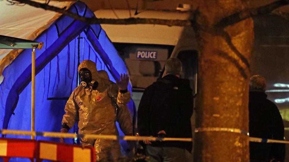 Investigators next to a police tent outside the Mill pub at the Maltings in Salisbury