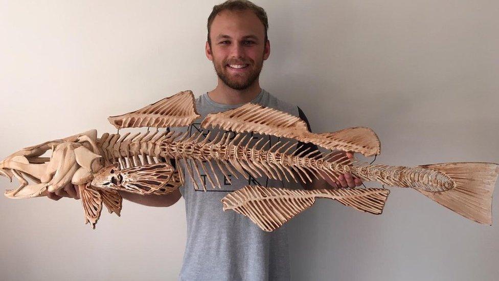 AUB student Sam Arthur with cod skeleton