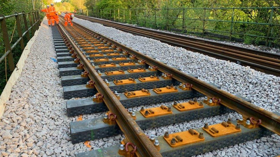 Railway sleepers being installed