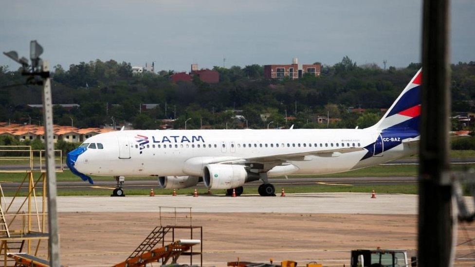 The LATAM plane parked at the Silvio Pettirossi International Airport in Paraguay on 27 October