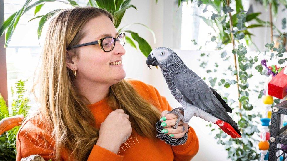 Lesley Herbert with her parrot