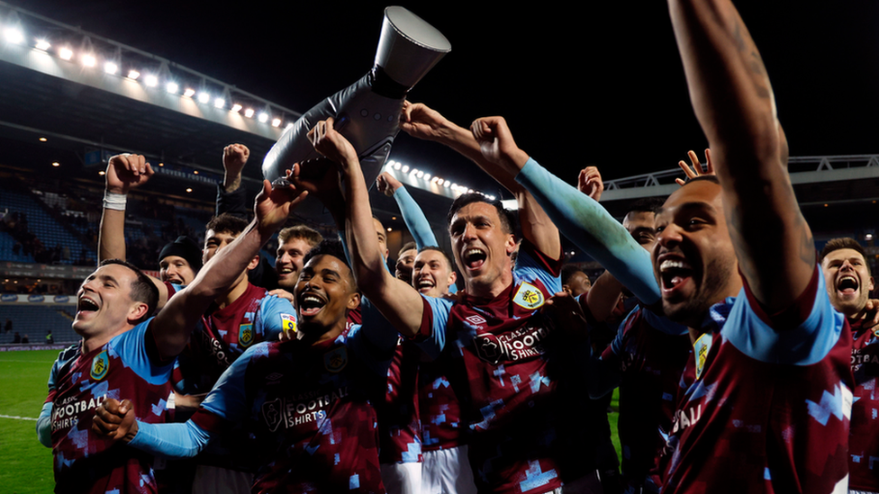 Burnley players celebrating on the pitch