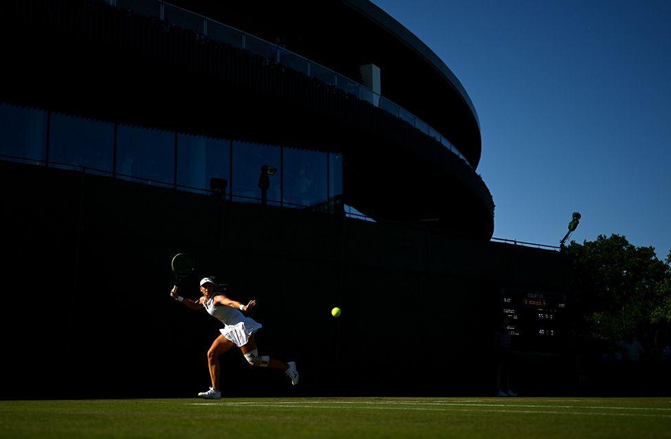 Dalma Galfi plays a forehand against Harriet Dart during the Ladies' Singles first round match on day one of Wimbledon. Photo by Hannah Peters