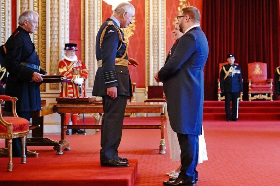 The King with Sergio and Emma Petrucci at Buckingham Palace