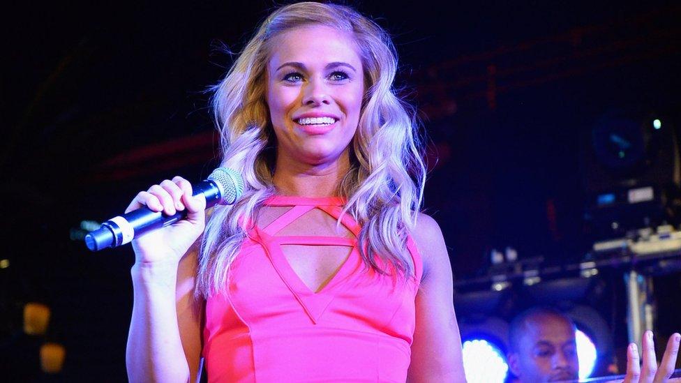 Paige Vanzant in a pink dress