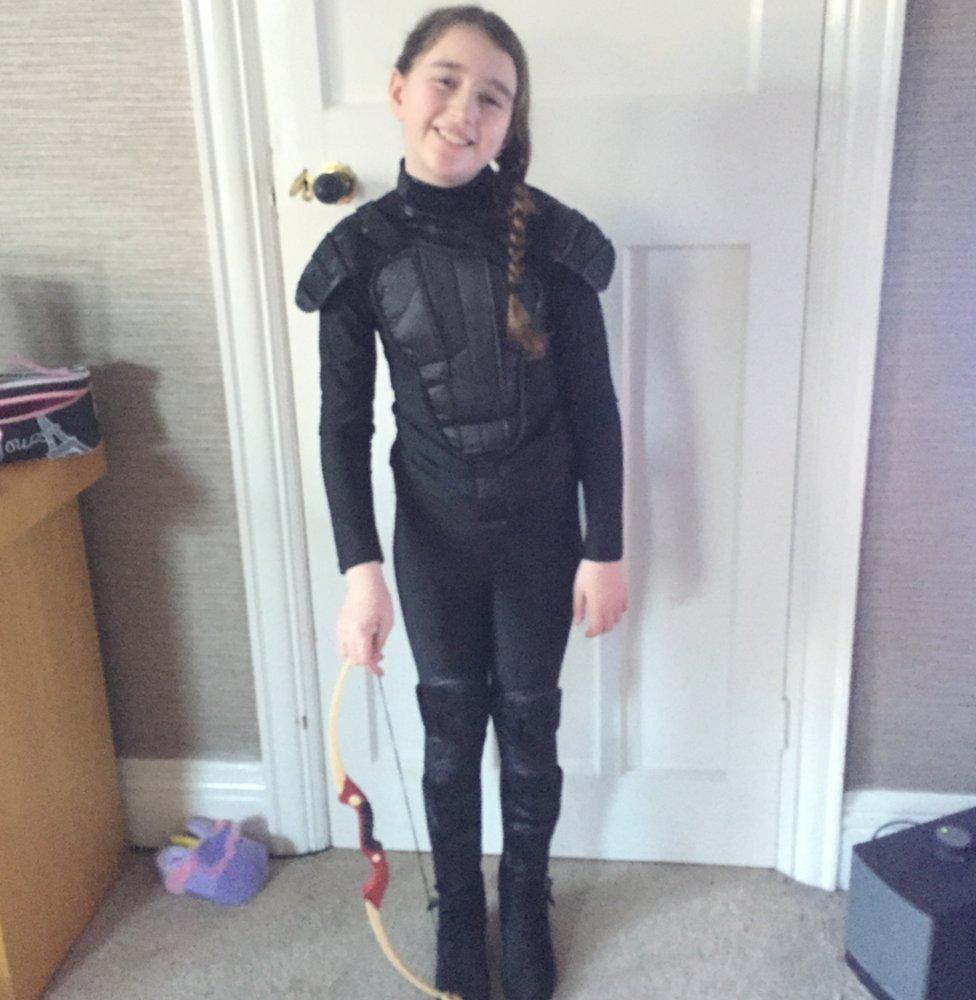 Bridie from Grimsby in England is ready to be a hero as Katniss Everdeen from The Hunger Games books