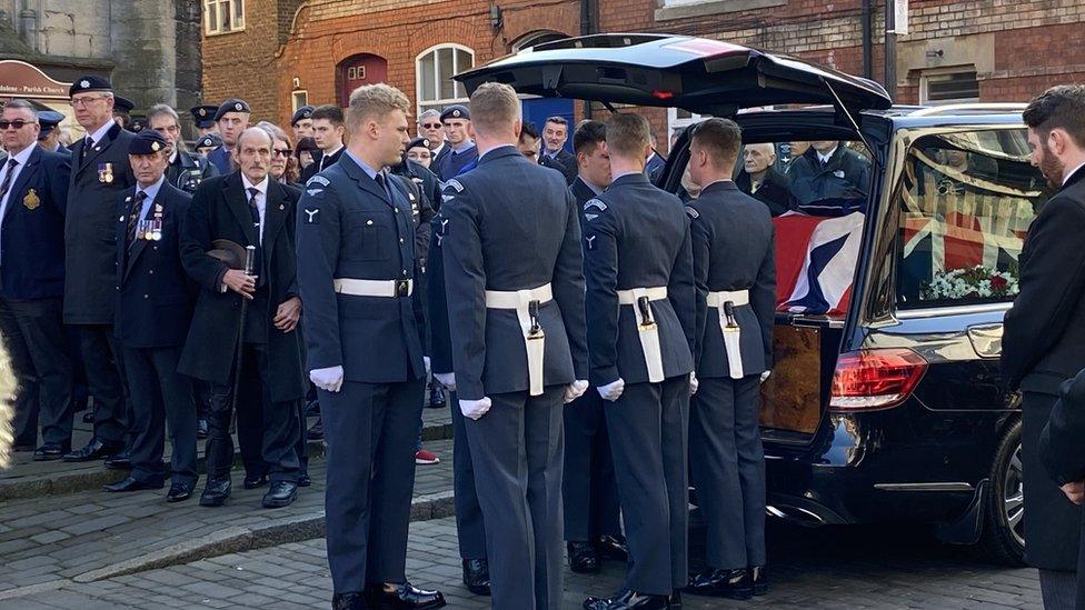 Mourners at Jim Auton's funeral