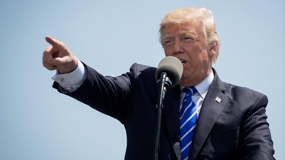 US President Donald Trump delivers the commencement address at the commencement ceremony at the U.S. Coast Guard Academy, May 17, 2017 in New London, Connecticut.