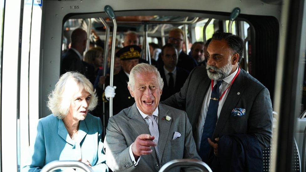 Their majesties caught a tram to the grand Place de la Bourse