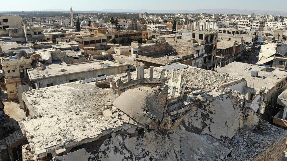 War-damaged buildings in the town of Binnish, in rebel-held Idlib province, Syria (24 September 2018)