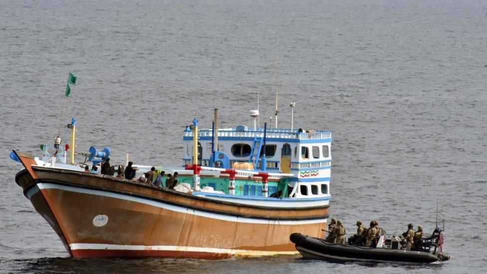 The suspicious ship was spotted by Sailors and Royal Marines