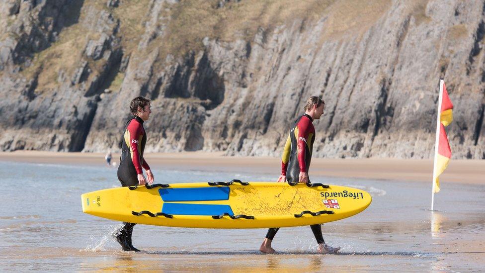 RNLI lifeguards training on Three Cliffs Bay