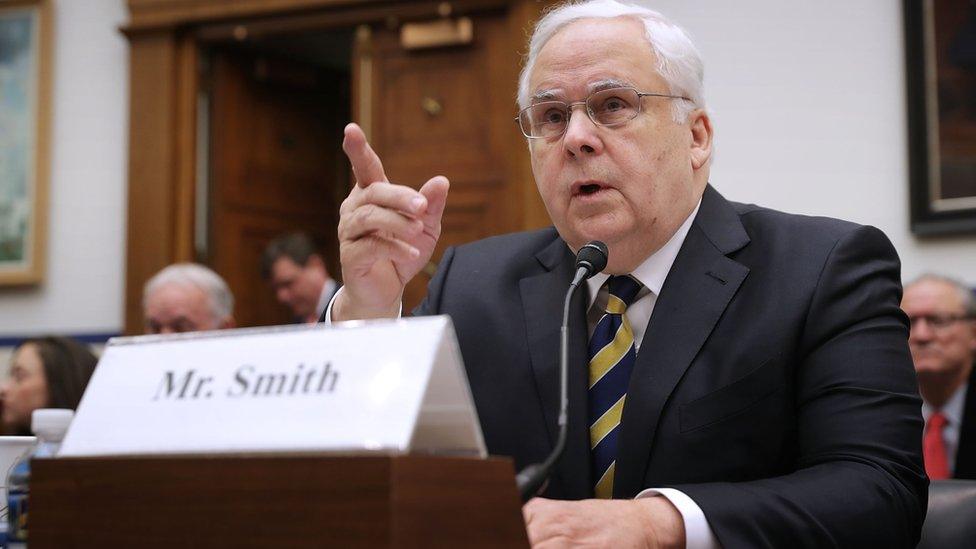 Federal Express founder Fred Smith speaks at a congressional hearing