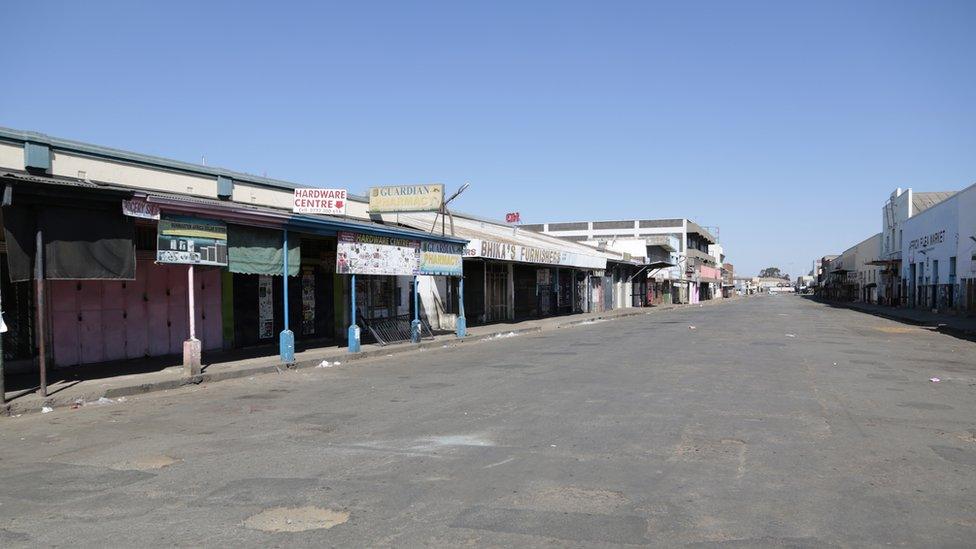 A deserted street and closed shops a day before anti government protests, in the central business district of Harare, Zimbabwe, 30 July 2020.