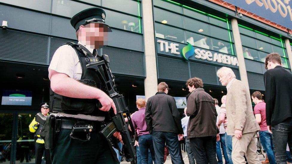 Armed police officer outside SSE Arena, Belfast