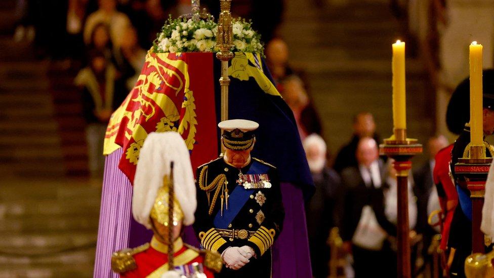 King Charles III stands vigil