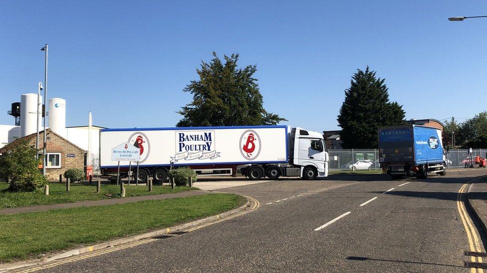 Lorries leaving Banham Poultry