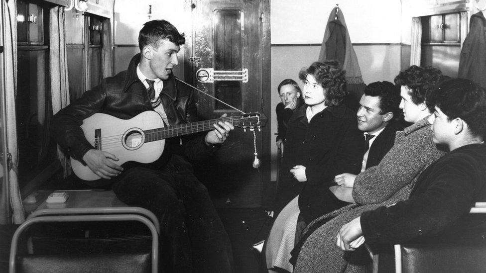 Busker in a Tube carriage