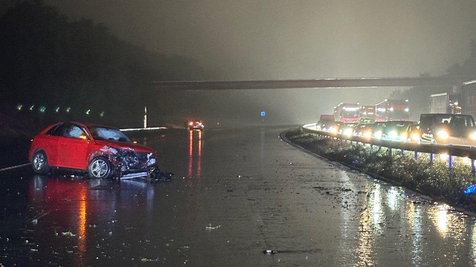 A car with damage to its front on the M5