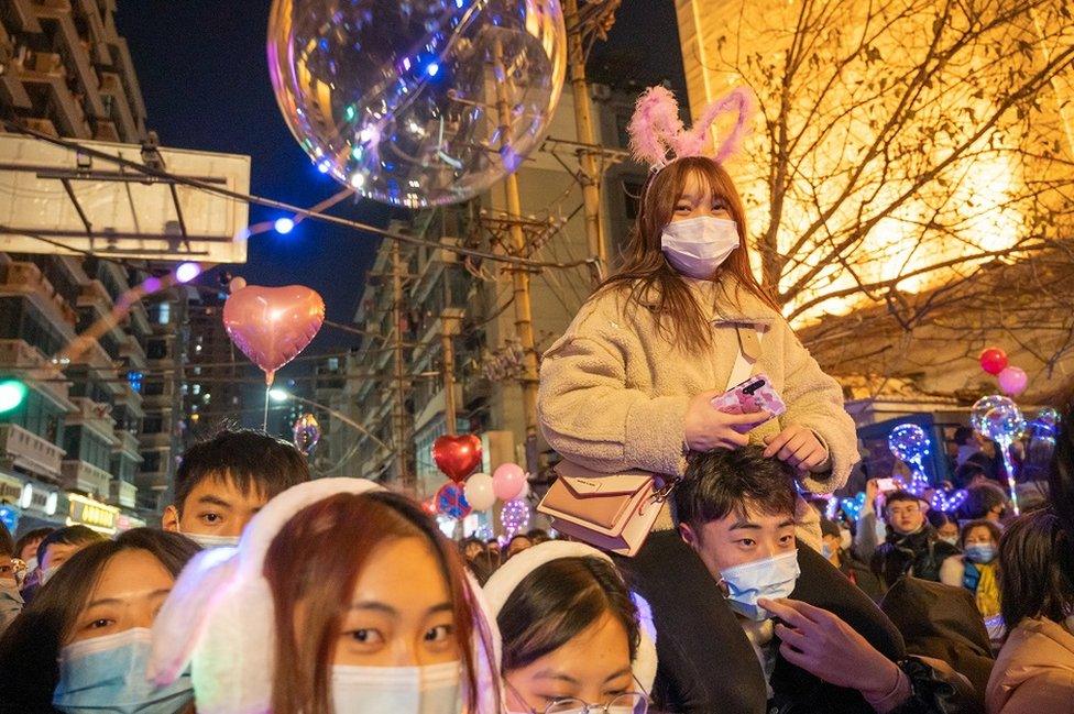 People attend New Year bell-ringing ceremony in front of Hankow Customs House during New Year's Eve celebrations on 31 December 2020 in Wuhan, Hubei Province of China