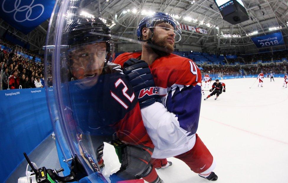 Michal Jordan tackles Rob Klinkhammer