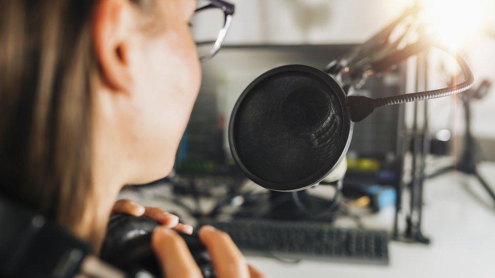 woman at microphone