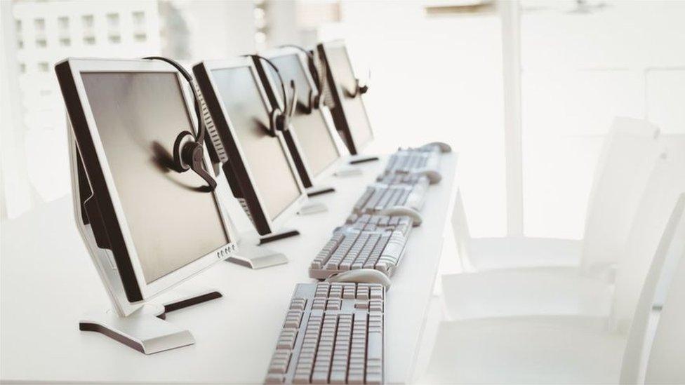 Computer monitors on a desk