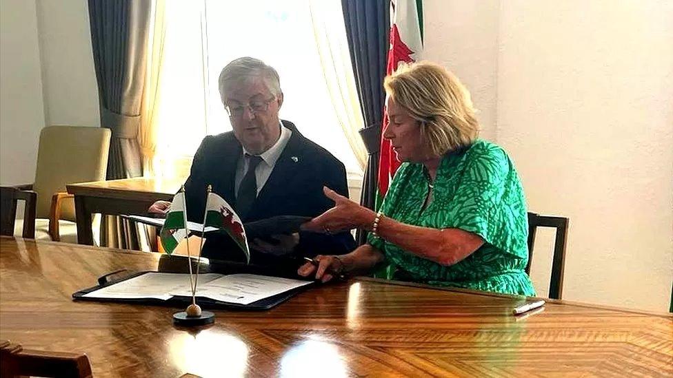 Cornwall Council leader Linda Taylor, pictured with First Minister of Wales Mark Drakeford, described the agreement as a "real step forward" after signing the agreement in July 2023