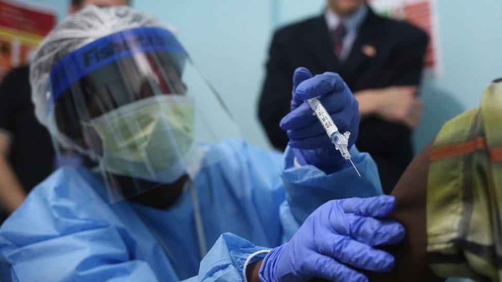 A nurse administers an injection on the first day of the Ebola vaccine study in Monrovia, Liberia, on February 2, 2015 .