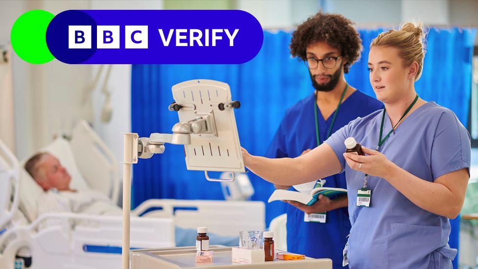 Two NHS staff members in a hospital.