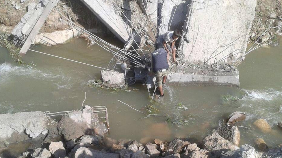 Photo purportedly showing bridge damaged by air strikes in northern Syria