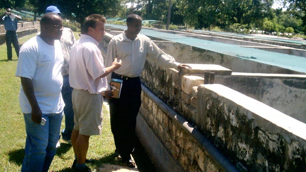 Visitors to the crocodile farm
