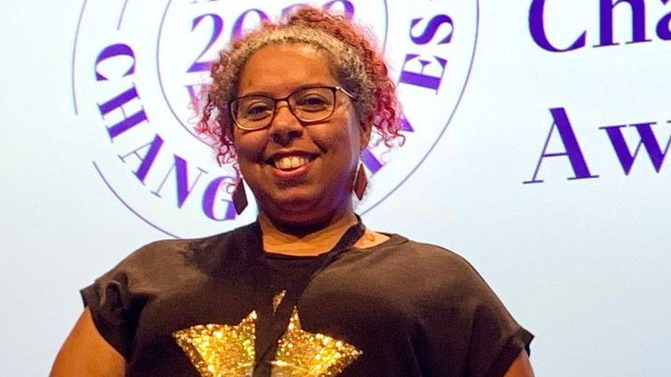 Elma Glasgow holding her award