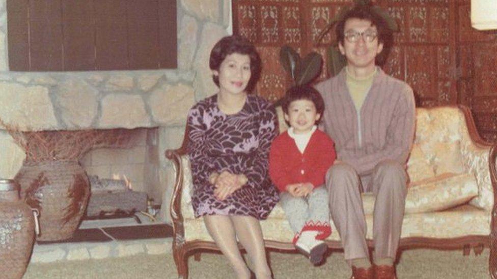 William Saito with his parents