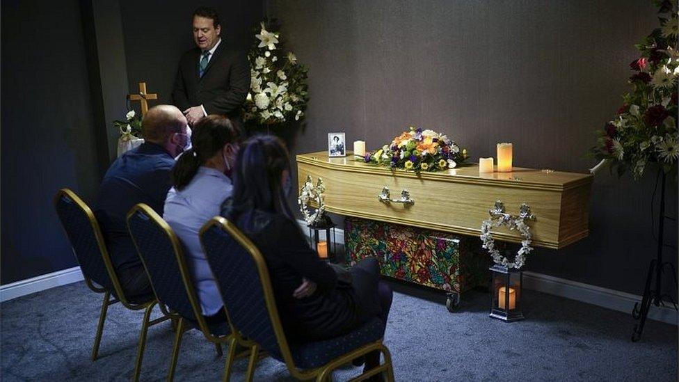 Mourners at a funeral