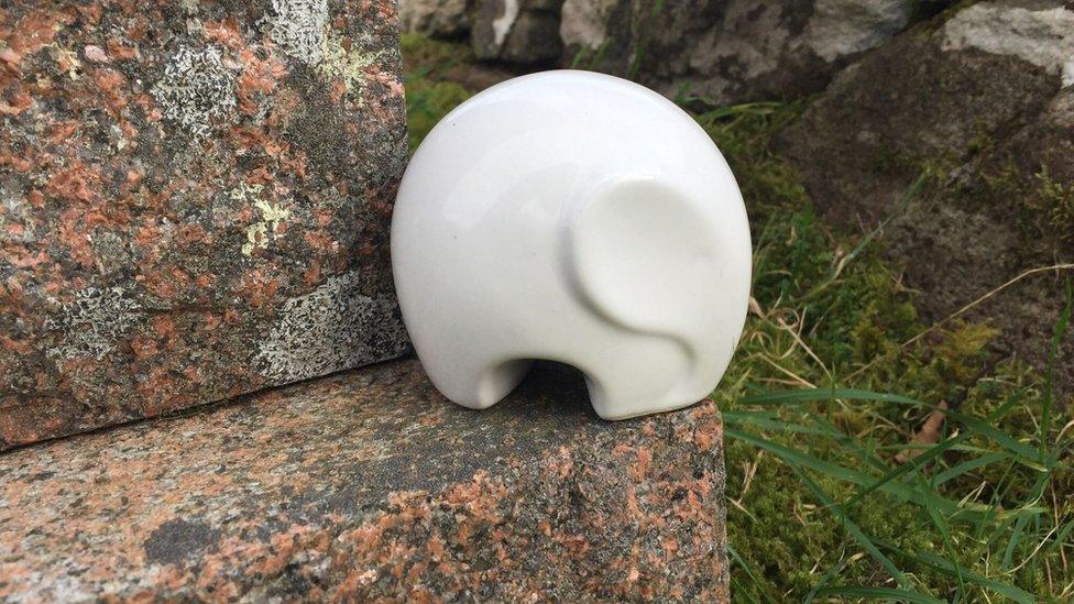 White elephant on gravestone