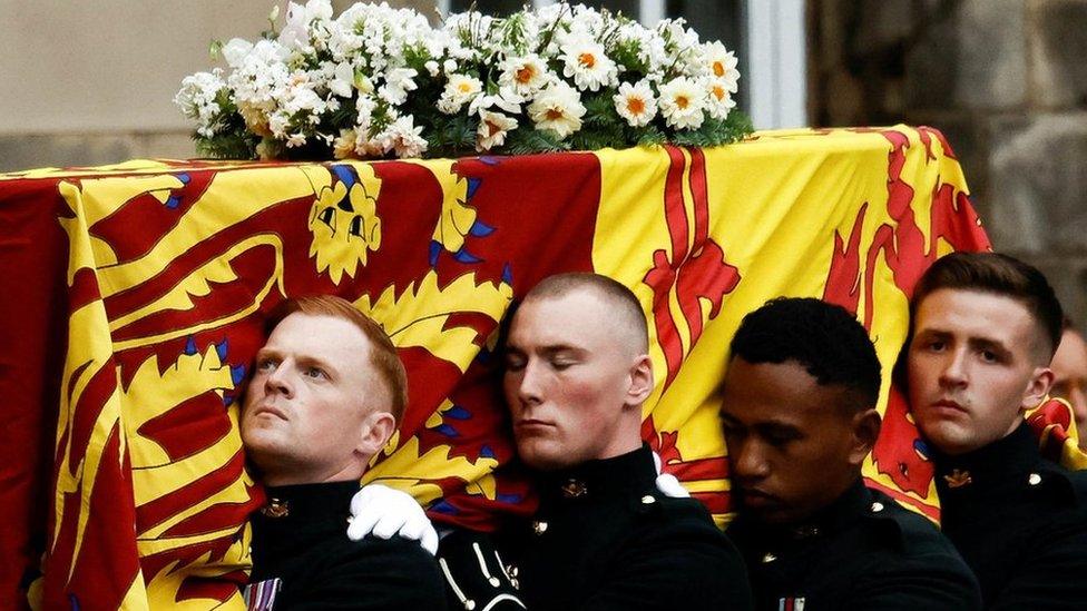 Pallbearers carrying the Queen's coffin