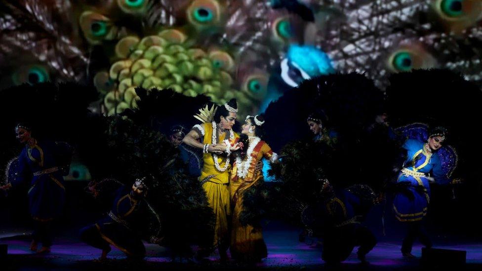 Artists perform in the roles of Sita (R), the wife of Hindu god Rama (L), in the 'Ramlila,' a 10-day enactment of the life of Hindu deity Rama which culminates in the festival of Dussehra, organised by Shriram Bharatiya Kala Kendra.