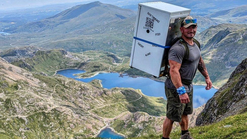 Michael Copeland standing on Snowdon