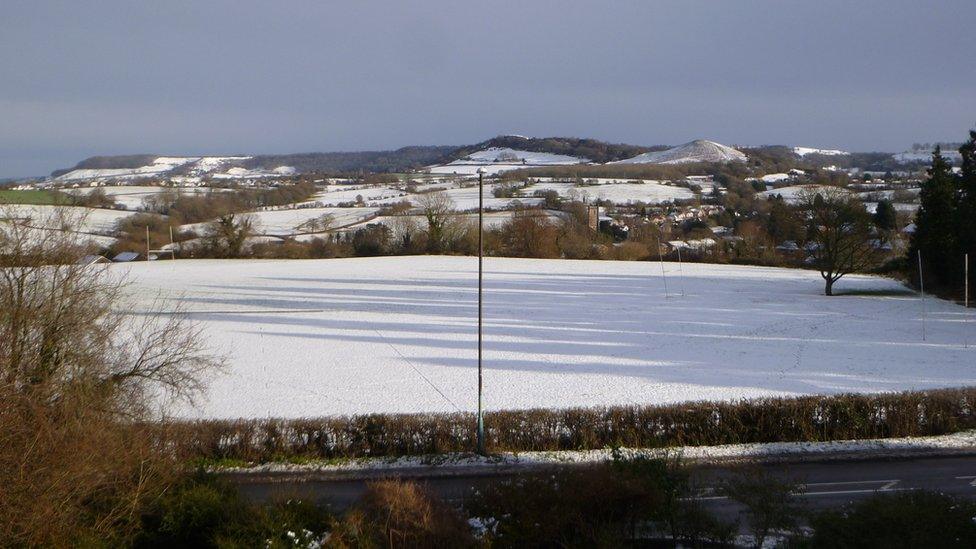 The snow settles in the countryside