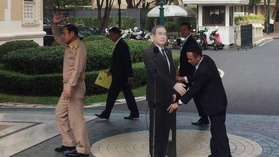 PM Prayuth Chan-ocha leaves a cardboard cutout at a news conference in Bangkok (9 Jan 2017)