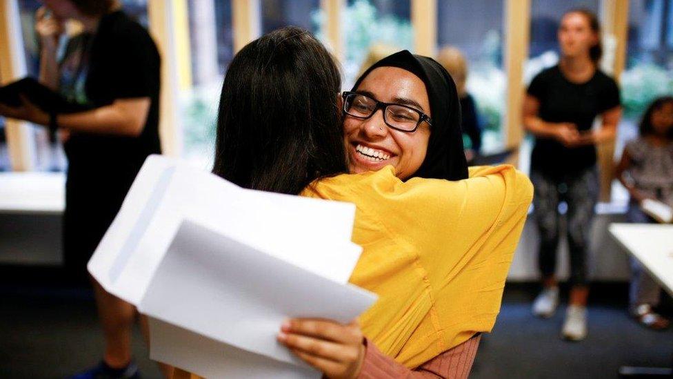 Girls celebrate at Stoke Newington School, London