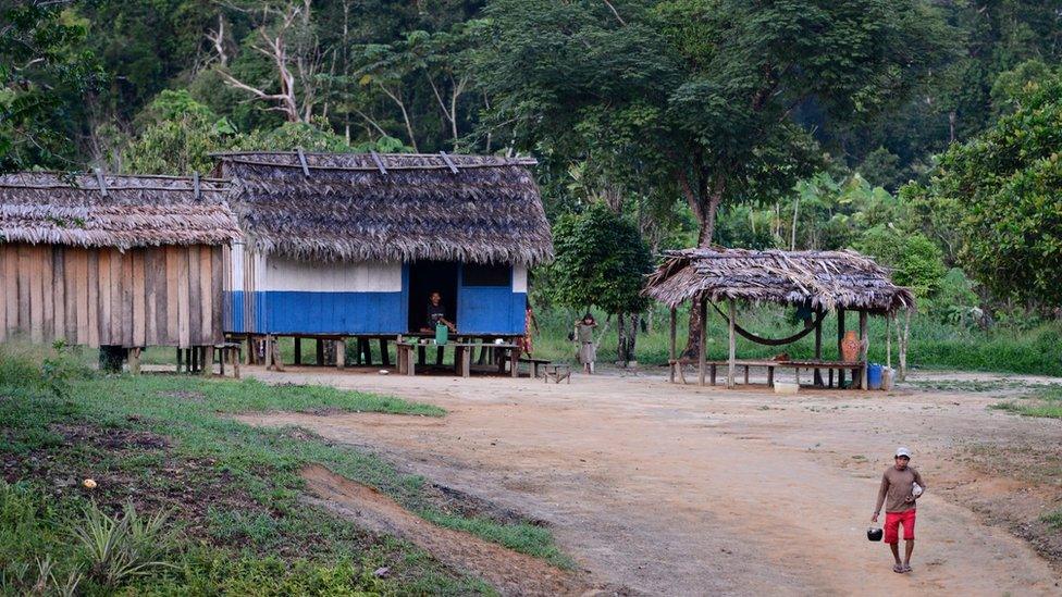 Houses and people in the Jamamadi land, which is in the south of the Amazon