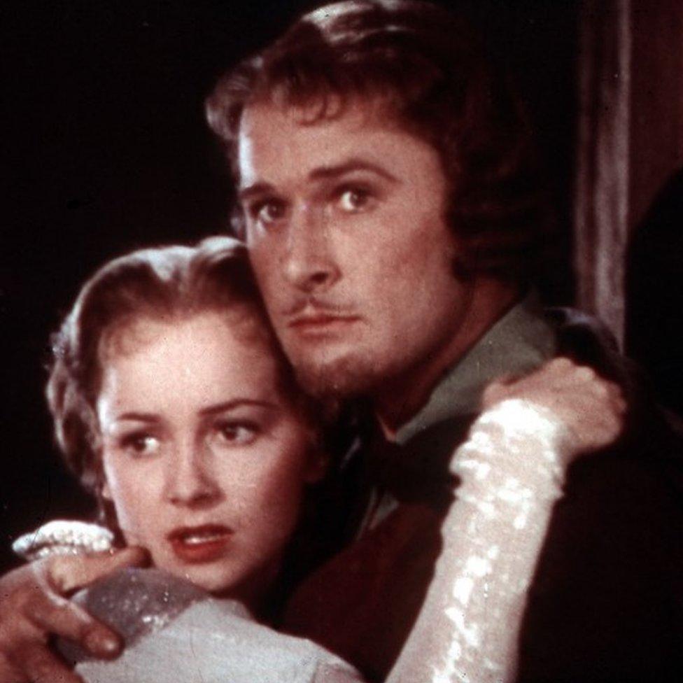 Olivia de Havilland & Errol Flynn in The Adventures of Robin Hood