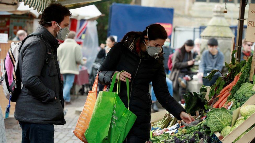 Shoppers at a market