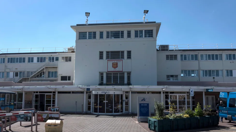 The front entrance to Jersey airport with a view of the arrivals area