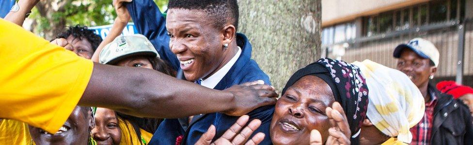 Victor Mlotshwa being welcomed by supporters at the Middelburg court in South Africa - October 2017