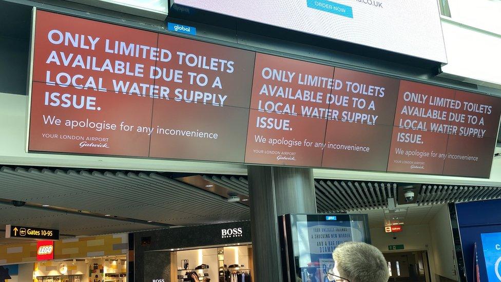 Signs for limited toilet availability at Gatwick Airport