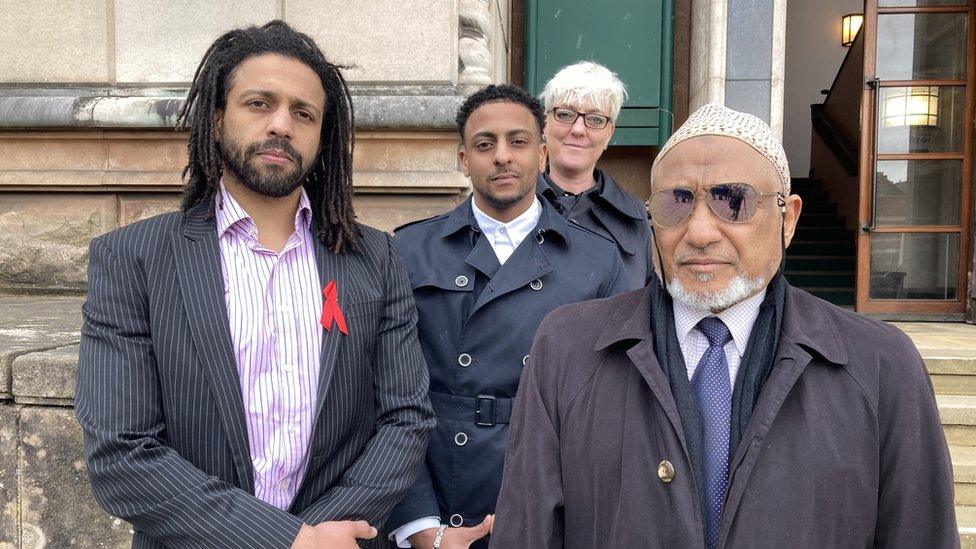 Mohannad, Mohamed, Kate Maynard, Mamoun in front of court